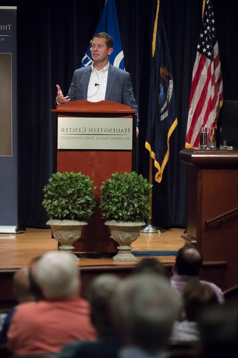 Hal Brands speaking at the podium